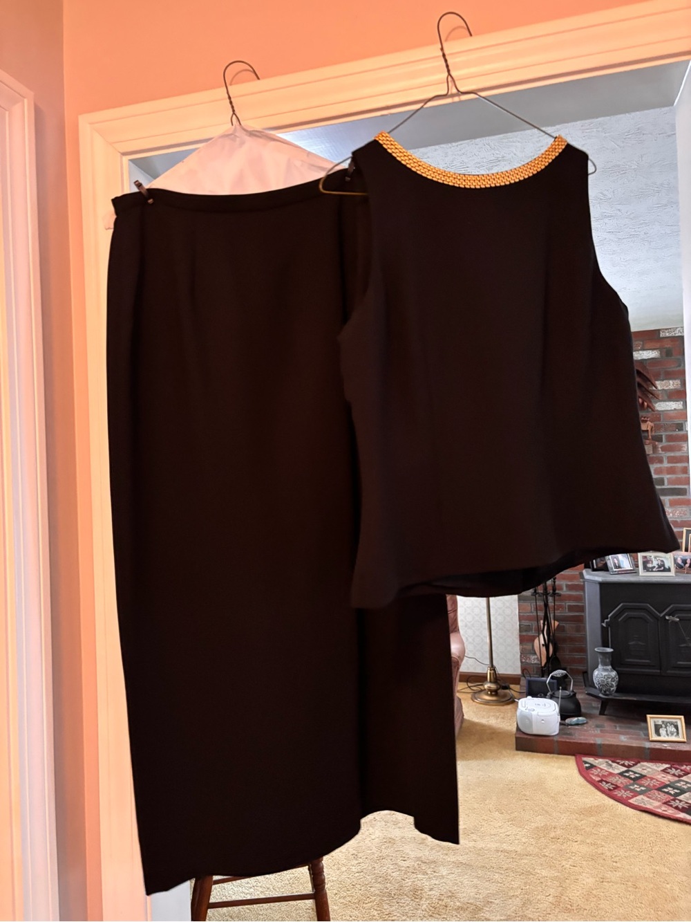 Black Two-Piece Skirt Set with Gold Link Neckline